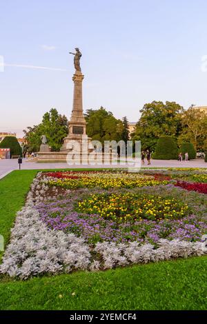 Ruse, Bulgaria - September 17, 2023: Sunset view of the Monument of Liberty, in the central square, with locals, and visitors, Ruse, northeastern Bulg Stock Photo