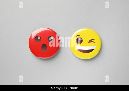 Badges displaying different emotions on grey background Stock Photo