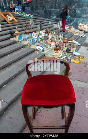 Flea market on the stairs of the central post office building in Naples Stock Photo