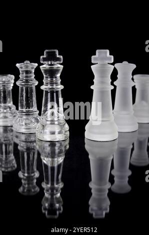 Chess pieces isolated on black background. Beautiful reflection composition Stock Photo