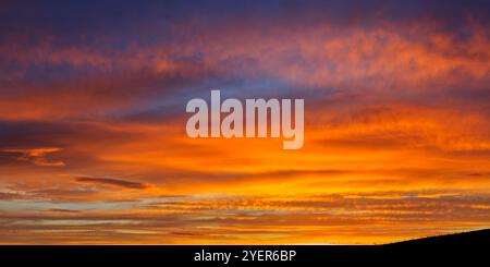 Firery red sky after sunset, Orkney Islands Stock Photo
