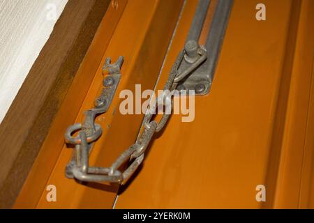 Old flat door chain Stock Photo