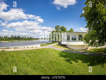 Dessau, GERMANY - June 23, 2024: The 'Kornhaus' building at the river Elbe in Dessau It is one of the many Bauhaus buildings in Dessau and today used Stock Photo