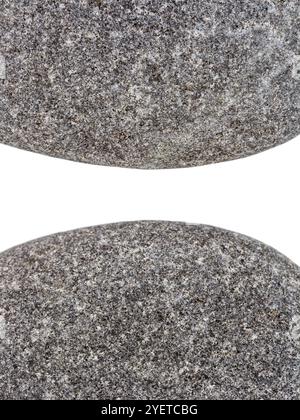 Edges of two pebbles isolated on white background with a space for text Stock Photo