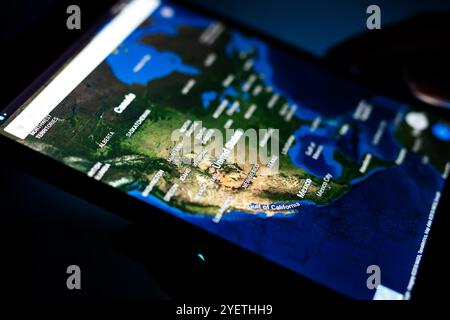 Kharkiv, Ukraine - 12 November 2018: close up tablet with Google map app on the screen with a dark background Stock Photo