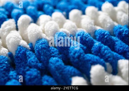 Fleece warm knitted background close-up. Stock Photo