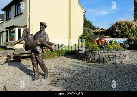 2013 bronze statue of John Wayne and Maureen O'Hara by sculptor Mark Rode from The Quiet Man film shot on location in 1951; Cong, Co. Mayo, Ireland. Stock Photo