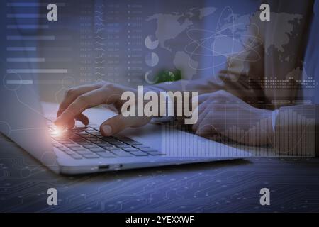 Technology and business. Woman working on laptop at table and graphs with schemes, double exposure Stock Photo