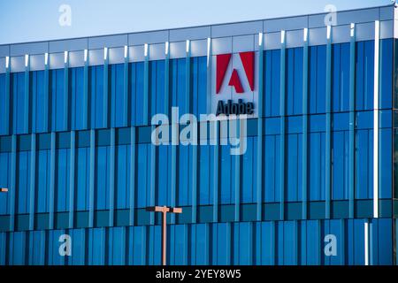 Exterior view of Adobe logo sign on August 31, 2024, in Lehi, Utah, USA. Adobe Inc. is an American computer software company based in San Jose, CA. Stock Photo
