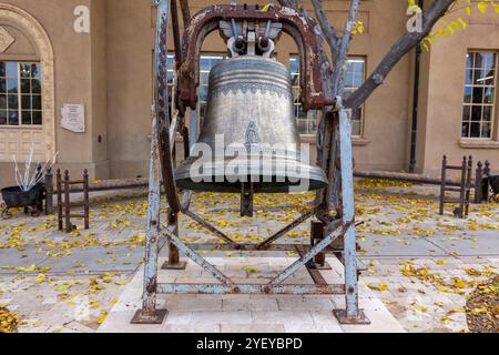 Old Iron Bell, Famous Historic Copper Art Museum Courtyard, Former 1928 High School Building Front View, Jerome Arizona Southwest US Stock Photo