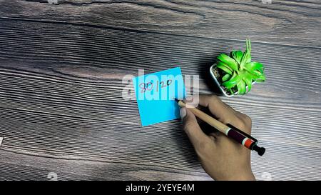 Concept of Marketing 80 per 20 write on sticky notes isolated on Wooden Table. Stock Photo