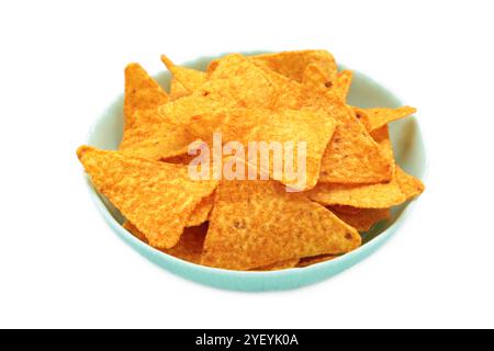 Crispy corn tortilla nachos chips in bowl isolated on white background. Top view Stock Photo