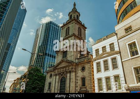 The church of St Botolph-without-Bishopsgate, in the City of London with the modern glass building called Bishopsgate behind it. London, England Stock Photo