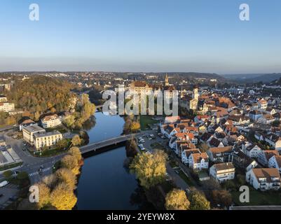 Aerial view of the town of Sigmaringen with the Hohenzollern Castle, a sight and tourist attraction above the old town and the Danube with autumnal ve Stock Photo