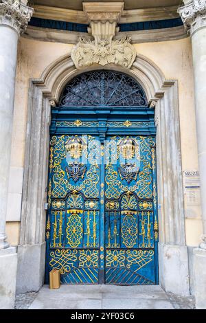 Ornate blue gilded door, entrance to Museum of the University of Wrocław, Wroclaw, Poland Stock Photo