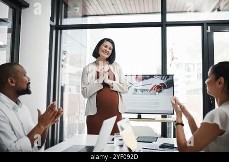 Presentation, pregnancy and businesswoman with applause in office with meeting for finance revenue statistics. Discussion, clapping hands and pregnant Stock Photo