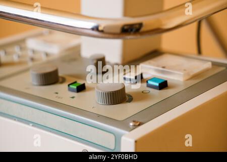 Vintage Medical Equipment Control Panel with Knobs and Buttons. Stock Photo