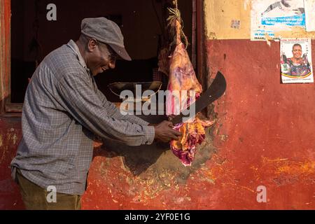 Butcher at the Masindi market, Western region, Uganda. Stock Photo