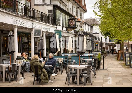 UK, Kent, Tunbridge Wells, Pantiles, clock above shops and restaurants Stock Photo