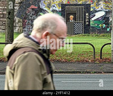 Glasgow, Scotland, UK. 2nd November, 2024. Donald trump in gorbals prison maga mual by local artist Ashley Rawson appeared in the railway arches in the gorbals area. Credit Gerard Ferry /Alamy Live News Stock Photo