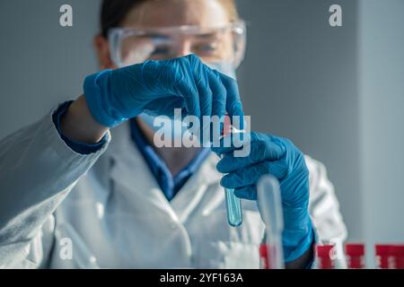 Cll Quality Lab A laboratory technician conducts quality-control testing at the Leefood ...