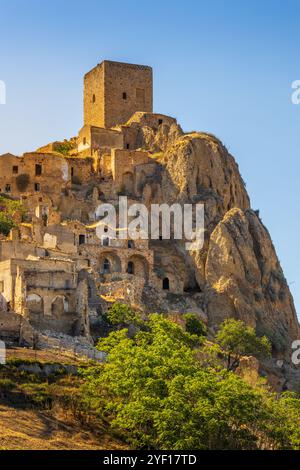 A picturesque view of the abandoned, old mountain town of Craco, built of sandstone rock. Craco is a ghost town abandoned due to an earthquake in the Stock Photo