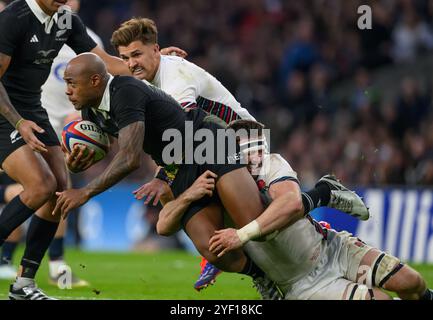 London, UK. 02nd Nov, 2024. England v New Zealand - Autumn Nations Series - Twickenham.                                                                            Mark Tele'a is tackled by Tom Curry.                                                  Picture Credit: Mark Pain / Alamy Live News Stock Photo