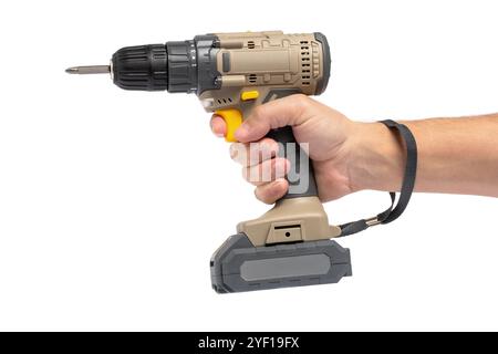 Cordless Drill Screwdriver in mans hand on white background. Concept of repair and craftsmanship Stock Photo