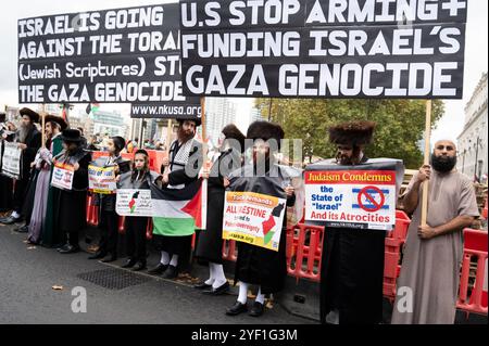 On November 2nd 2024 thousands of people met in Whitehall to march to the American Embassy in support of Palestine, demanding a ceasefire and the end Stock Photo