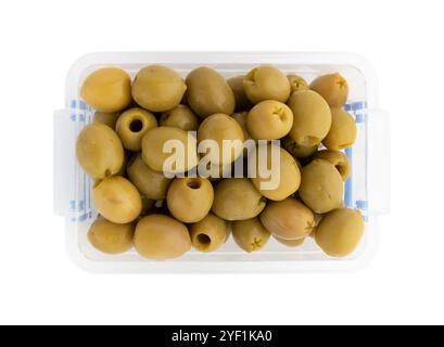 tasty green olives in plastic box isolated on white background with clipping path, vegan food, top view Stock Photo