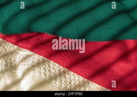 Wool knitted sweaters texture clothing background Stock Photo