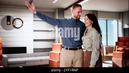 Young Couple Buying And Moving Into New Home Stock Photo
