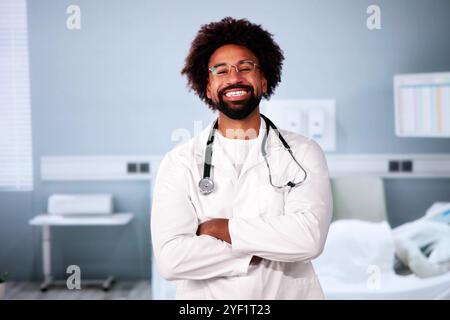 Happy African American Stethoscope Doctor In Hospital Stock Photo