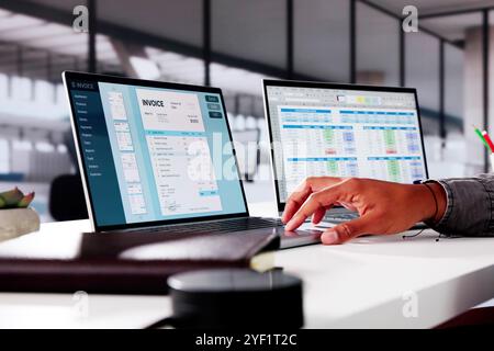 Medical Account Manager In Office Analyzing Billing Codes Stock Photo