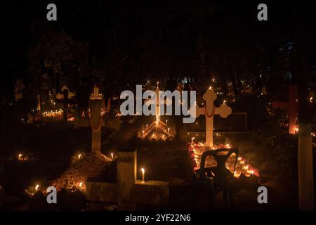 Dhaka, Bangladesh. 02nd Nov, 2024. Graves decorated with flowers and candles seen during All Souls Day. All souls day is celebrated by Christians paying tribute to their friends and relatives, who have passed away. The graves are beautifully decorated with flowers, candles and incense sticks. (Photo by Sazzad Hossain/SOPA Images/Sipa USA) Credit: Sipa USA/Alamy Live News Stock Photo