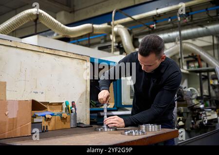 Cnc milling machine creating metal parts in modern factory Stock Photo
