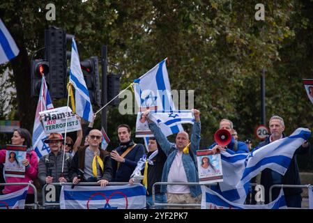 London, UK. 02nd Nov, 2024. Protestors hold Israeli flags and chant slogans during the Stop The Hate UK Rally. ‘Stop The Hate UK' held a counter protest on the corner of Millbank and Vauxhall Bridge to voice opposition to The Palestine Solidarity Campaign march. Credit: SOPA Images Limited/Alamy Live News Stock Photo