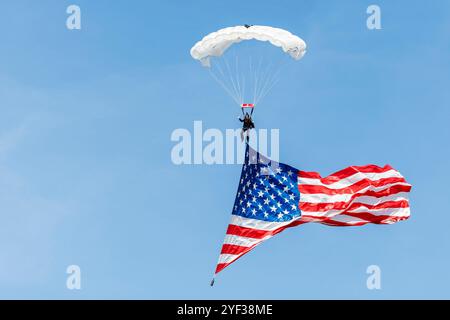 West Lafayette, Indiana, USA. 2nd Nov 2024. West Lafayette, Indiana, USA. 02nd Nov, 2024. A general view of paratrooper with the American Flag during the National Anthem prior to NCAA football game action between the Northwestern Wildcats and the Purdue Boilermakers at Ross-Ade Stadium in West Lafayette, Indiana. John Mersits/CSM/Alamy Live News Credit: Cal Sport Media/Alamy Live News Stock Photo