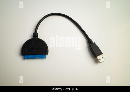 USB to SATA cable adapter for connecting hard drives to computers Stock Photo