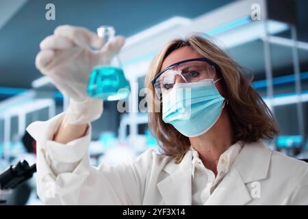 Scientist In Lab Doing Pharmaceutical Research And Development Stock Photo
