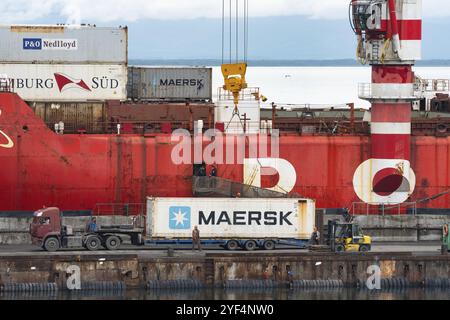 Crane unloading container cargo ship Sevmorput Corporation Atomflot, Russian nuclear powered icebreaker lighter aboard ship carrier. Terminal commerci Stock Photo