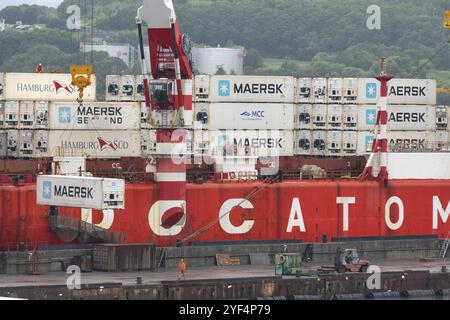 Crane unloaded container cargo ship Sevmorput Rosatomflot, Russian nuclear-powered icebreaker lighter aboard ship carrier. Terminal commercial seaport Stock Photo