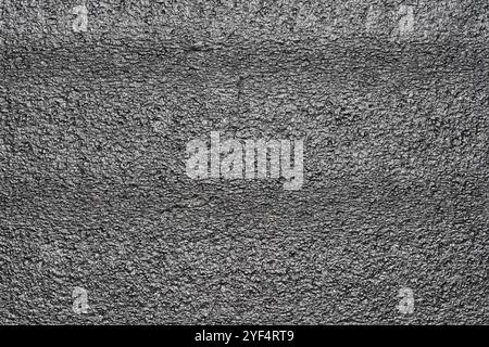 Black abstract polystyrene foam background texture. Close-up detail view of styrofoam pattern, plastic sheet, polystyrene abstract synthetic packaging Stock Photo