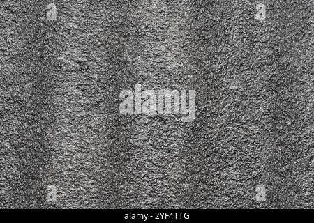 Black abstract polystyrene foam background texture. Close-up detail view of styrofoam, plastic sheet, polystyrene abstract synthetic packaging materia Stock Photo