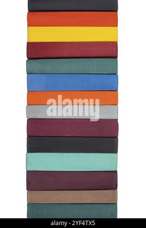 Stack of old hardcover books on bookshelf. Close-up view of multi-colored vintage hardback books. Objects isolated on white background Stock Photo