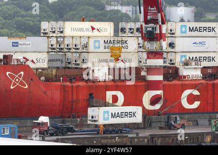 Crane unloaded container cargo ship Sevmorput FSUE Atomflot, Russian nuclear-powered icebreaker lighter aboard ship carrier. Terminal commercial seapo Stock Photo