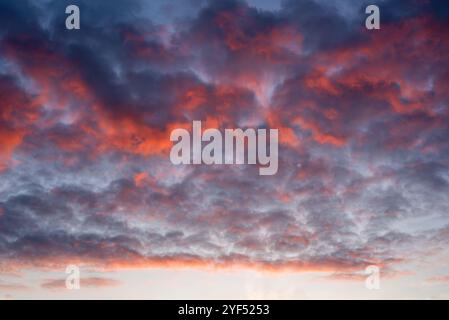 October dramatic colorful sunset cloudy sky Stock Photo