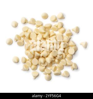 Heap of white chocolate chips close up isolated on white background Stock Photo