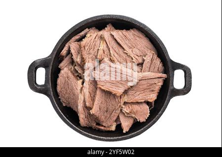 Boiled and sliced beef meat with spices and herbs isolated on white background. Stock Photo