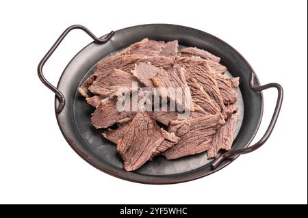 Boiled and sliced beef meat with spices and herbs isolated on white background. Stock Photo